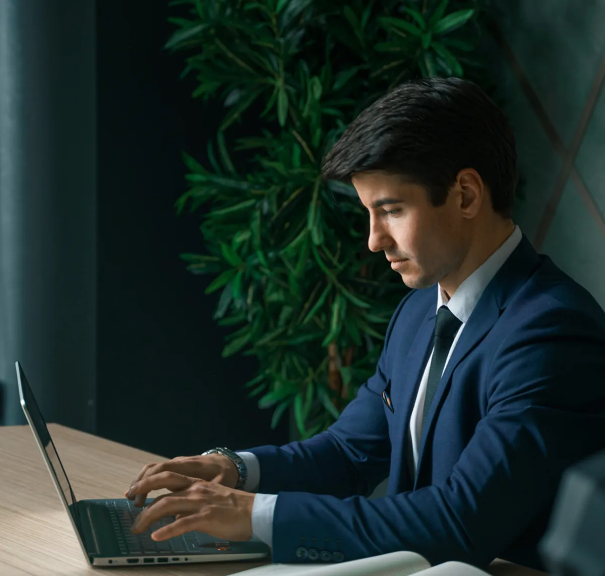 A CSP Control Center customer working on a laptop